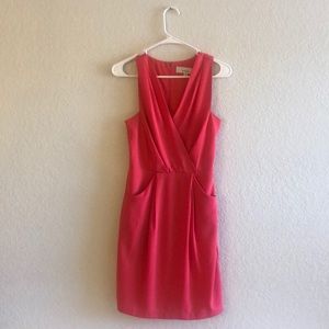 Pink dress with pockets.